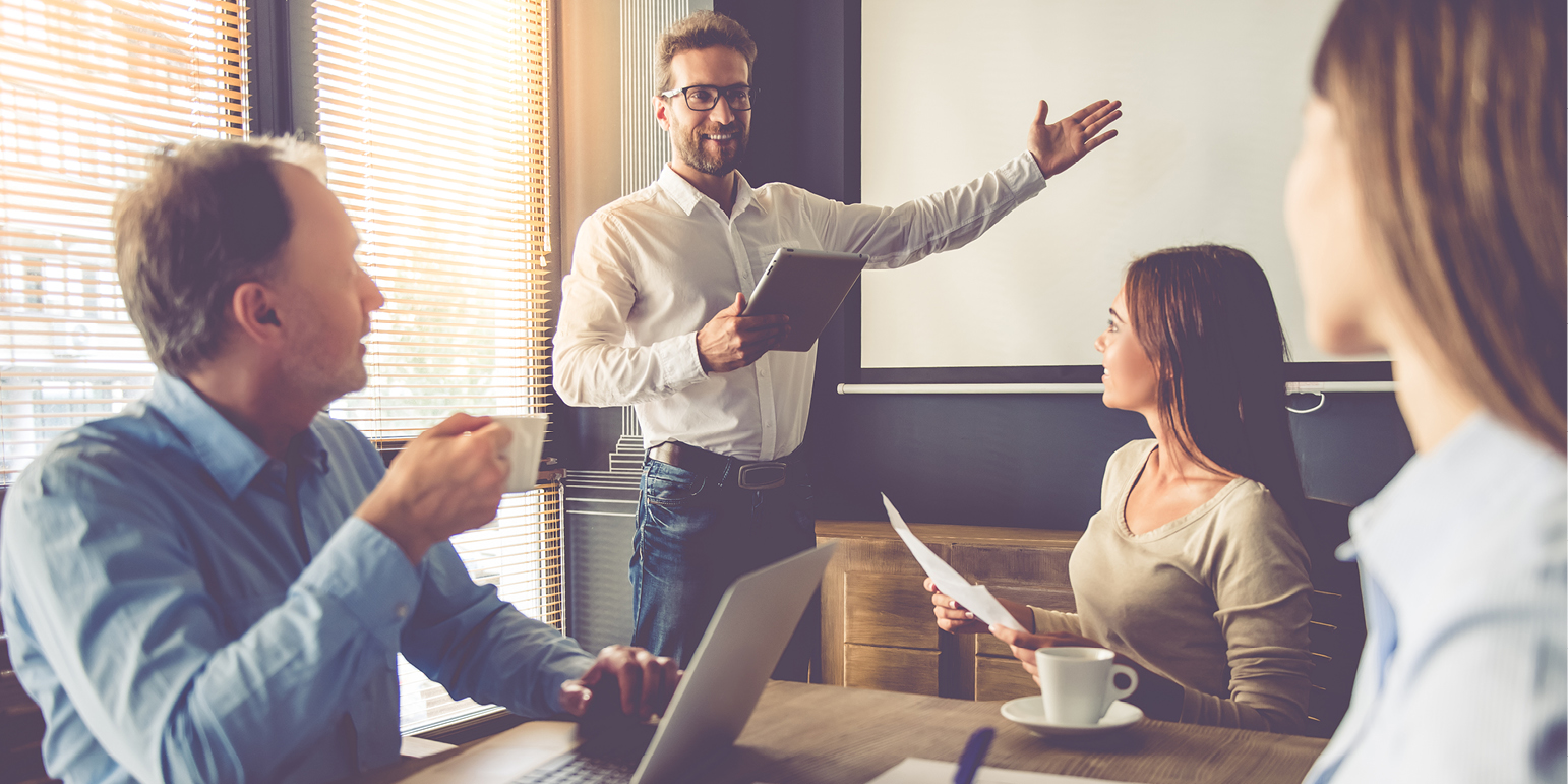 People in a meeting - someone presenting