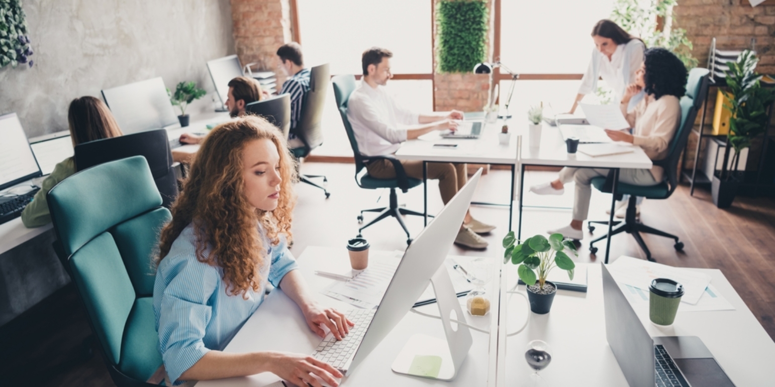 open plan office with people working at desks